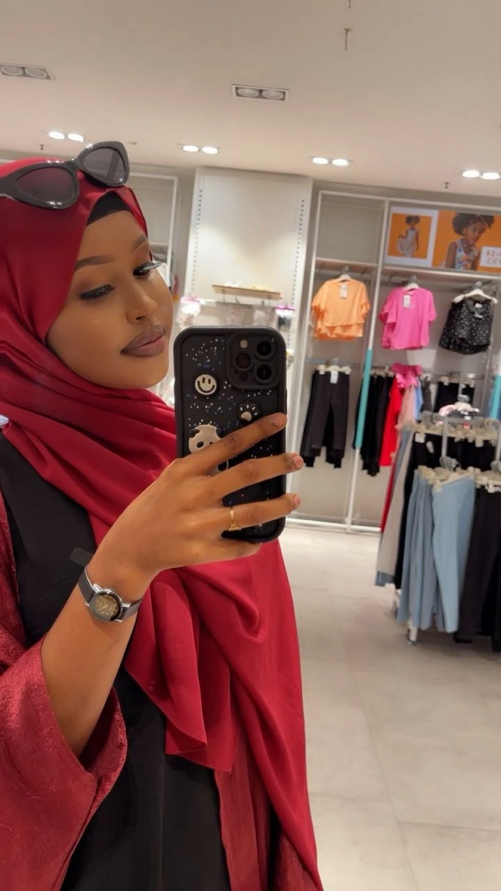 Sabiriin Muhumed, Founder and CEO of Ria Hijabs, wearing a red hijab